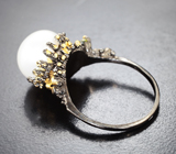 Серебряное кольцо с жемчужиной и перидотом