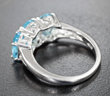Превосходное серебряное кольцо с голубыми топазами