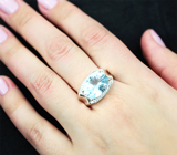Шикарное серебряное кольцо с голубым топазом лазерной огранки