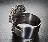 Серебряное кольцо с перидотами