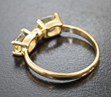 Золотое кольцо с чистейшими диаспорами 1,62 карата и гранатом со сменой цвета