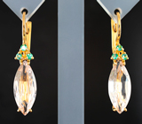 Золотые серьги с персиковыми морганитами редкой огранки 4,5 карата и «неоновыми» уральскими изумрудами Золото