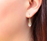 Золотые серьги с персиковыми морганитами редкой огранки 4,5 карата и «неоновыми» уральскими изумрудами Золото