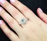 Ажурное серебряное кольцо с голубым топазом