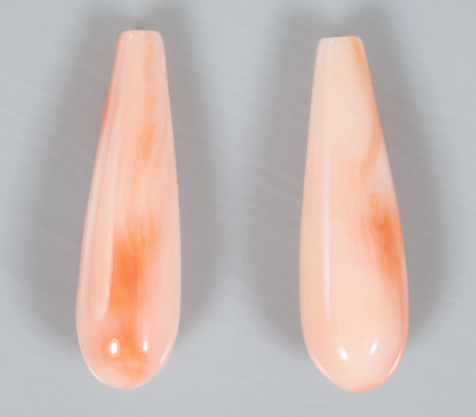 Пара solid кораллов 5,7 карата