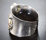 Серебряное кольцо с голубым топазом и аметистами Серебро 925