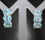 Стильные серебряные серьги с голубыми топазами Серебро 925