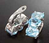 Стильные серебряные серьги с голубыми топазами Серебро 925