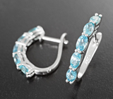 Чудесные серебряные серьги с голубыми цирконами Серебро 925