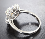 Эффектное серебряное кольцо с кристаллическим эфиопским опалом и иолитами