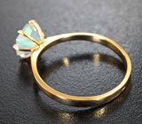 Золотое кольцо с ярким эфиопским опалом авторской огранки 0,88 карата