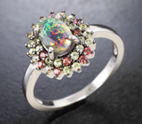 Праздничное серебряное кольцо с ограненным черным опалом и сапфирами