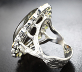 Серебряное кольцо с лабрадоритом 18,28 карата и перидотами