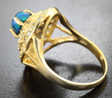 Серебряное кольцо с кристаллическим черным опалом и топазами