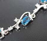 Изысканный серебряный браслет с насыщенно-синими топазами