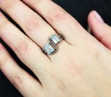 Серебряное кольцо с голубыми топазами и черными шпинелями