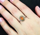 Серебряное кольцо с ограненным эфиопским оплаом и сапфирами