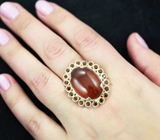 Серебряное кольцо с крупным карнелианом 17,71 карата и родолитами