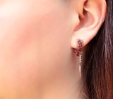 Изысканные серебряные серьги с рубинами и родолитами гранатами
