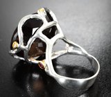 Серебряное кольцо с дымчатым кварцем 33,39 карата и гранатами