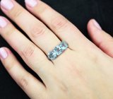 Превосходное серебряное кольцо с голубыми топазами