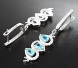 Изысканные серебряные серьги с апатитами
