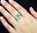 Золотое кольцо с чистейшим голубым топазом 12,81 карата