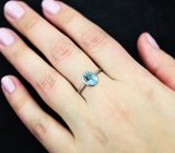 Изящное cеребряное кольцо с голубым топазом