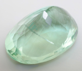 Крупный голубовато-зеленый «неоновый» флюорит 19,22 карата 