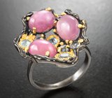 Серебряное кольцо с корундами и голубыми топазами