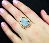 Серебряное кольцо с резным агатом и голубыми топазами