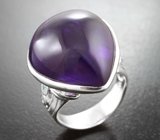 Серебряное кольцо со сливовым аметистом 30,93 карата и голубыми топазами
