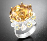 Серебряное кольцо с цитрином и голубыми топазами