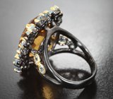 Серебряное кольцо с крупным цитрином и голубыми топазами