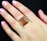 Серебряное кольцо с крупным цитрином и голубыми топазами