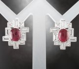 Оригинальные серебряные серьги с рубинами