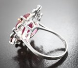 Серебряное кольцо с крупным рубином 7,83 карата и альмандинами гранатами