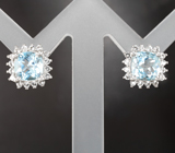 Прелестные серебряные пусеты с голубыми топазами Серебро 925