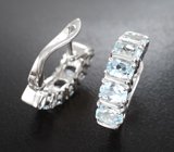 Серебряные серьги с голубыми топазами