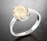 Серебряное кольцо с ограненным эфиопским опалом и разноцветными сапфирами