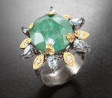Серебряное кольцо с крупным изумрудом 10,82 карата и голубыми топазами