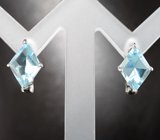 Изящные серебряные серьги с голубыми топазами авторской огранки