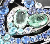 Брошь/кулон с лунным камнем, «неоновыми» апатитами, флюоритами, кианитами, иолитом, бесцветными цирконами, лавандовым и синими сапфирами