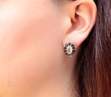 Серебряные серьги с ограненным лунным камнем и черными шпинелями