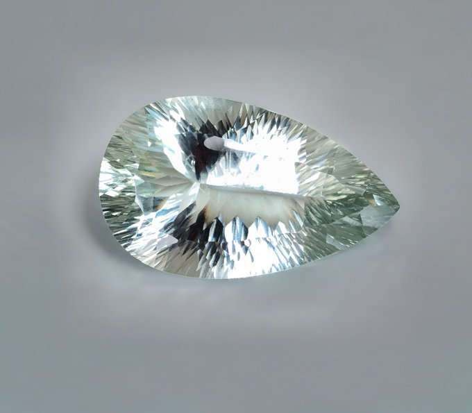 Крупный! Чистейший зеленый аметист лазерной огранки 49,51 карата