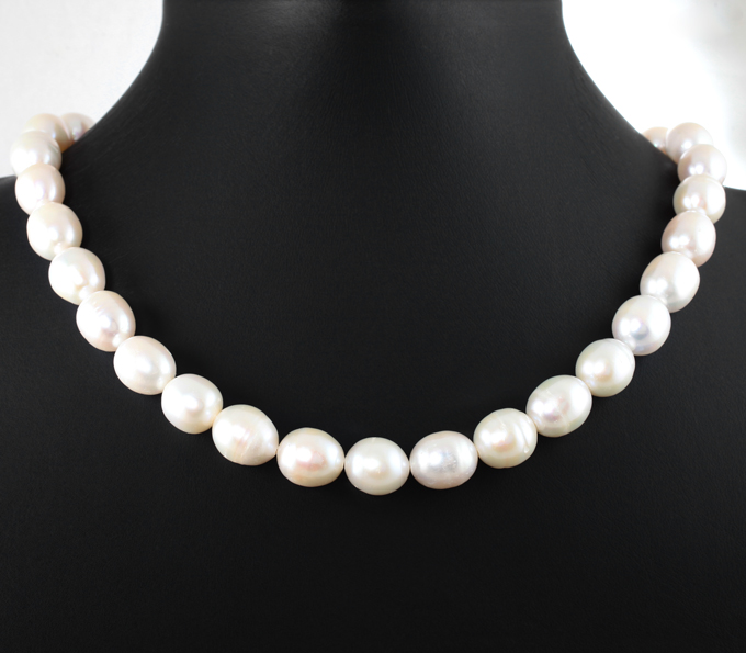 Массивное золотое колье с крупным морским жемчугом барокко 332,1 карата