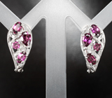 Ажурные серебряные серьги с родолитами