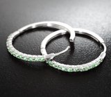 Эффектные серебряные серьги с цаворитами