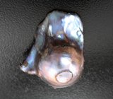 Крупная черная морская жемчужина барокко 55,83 карата! Титановый люстр