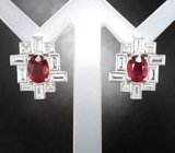 Эффектные серебряные серьги с рубинами